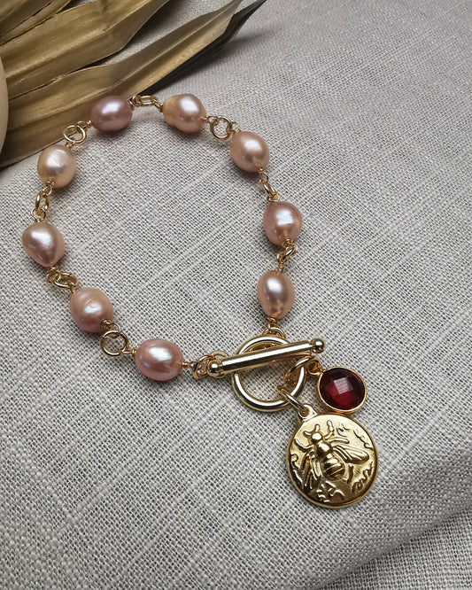 Hand-Wrapped Peach Freshwater Pearl Bracelet with Charms - Vinta Shop