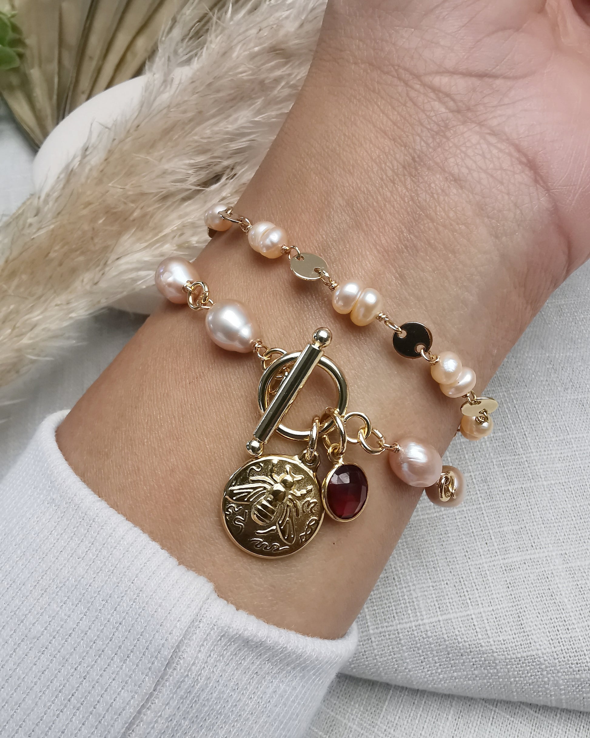 Hand-Wrapped Peach Freshwater Pearl Bracelet with Charms - Vinta Shop