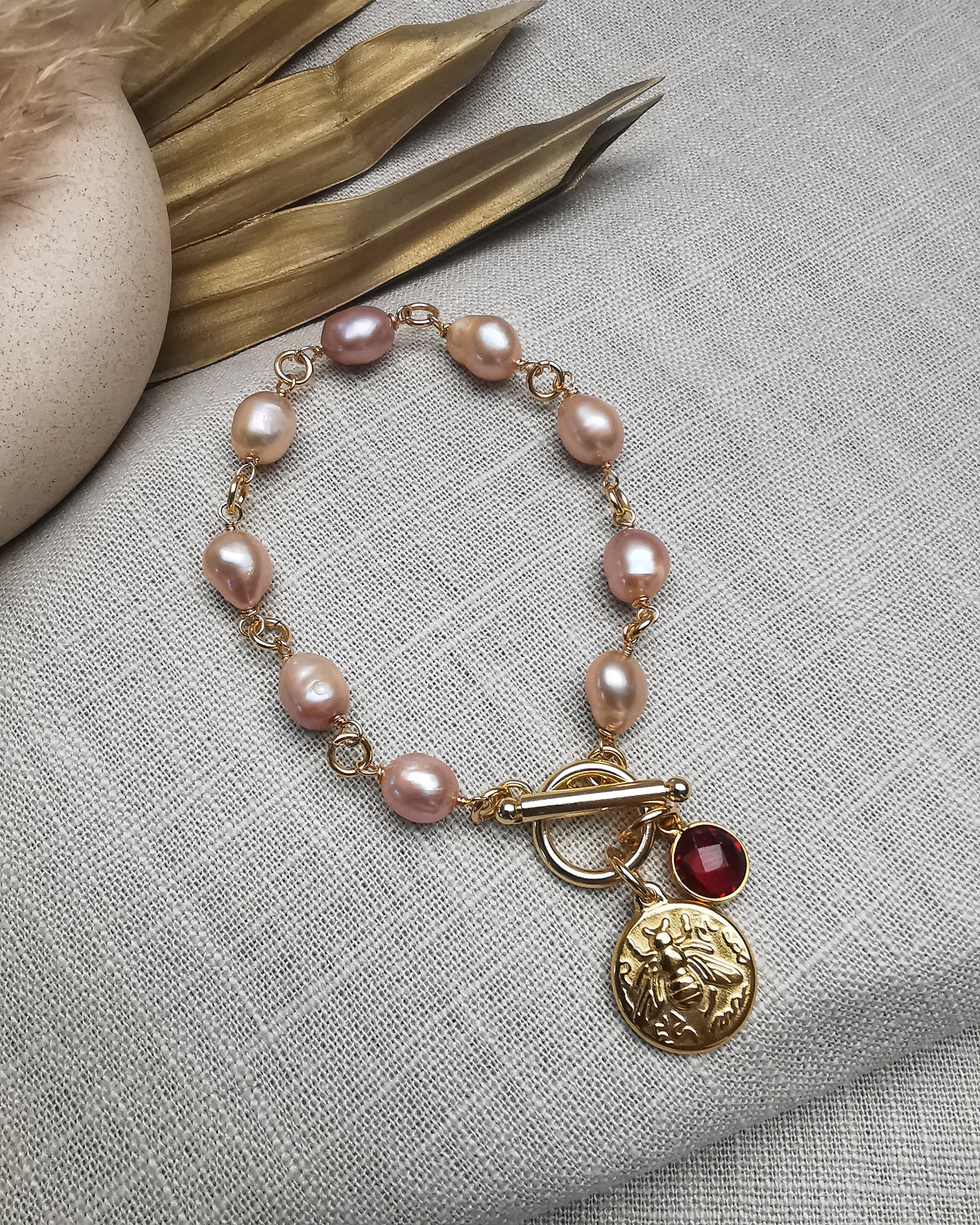 Hand-Wrapped Peach Freshwater Pearl Bracelet with Charms