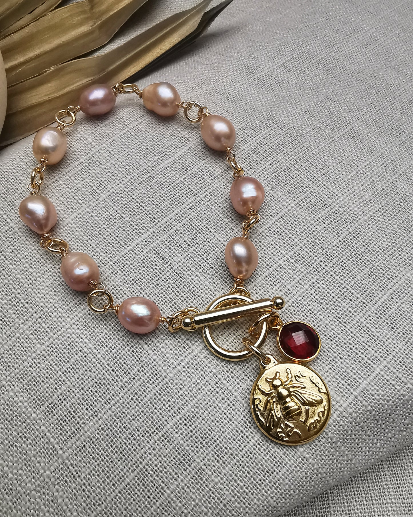 Hand-Wrapped Peach Freshwater Pearl Bracelet with Charms