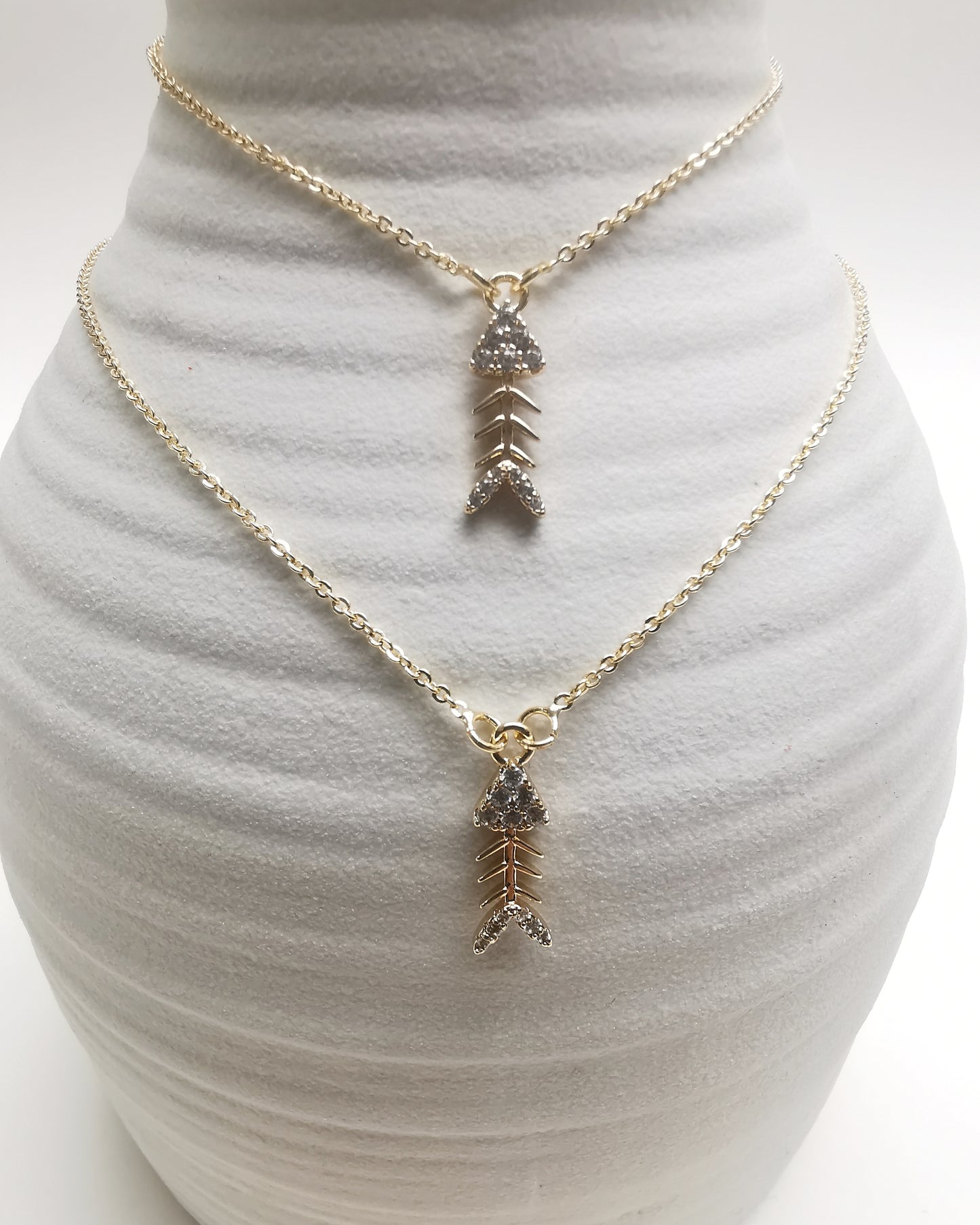 Fish Bone Charm Earrings with Cubic Zirconia Accents.