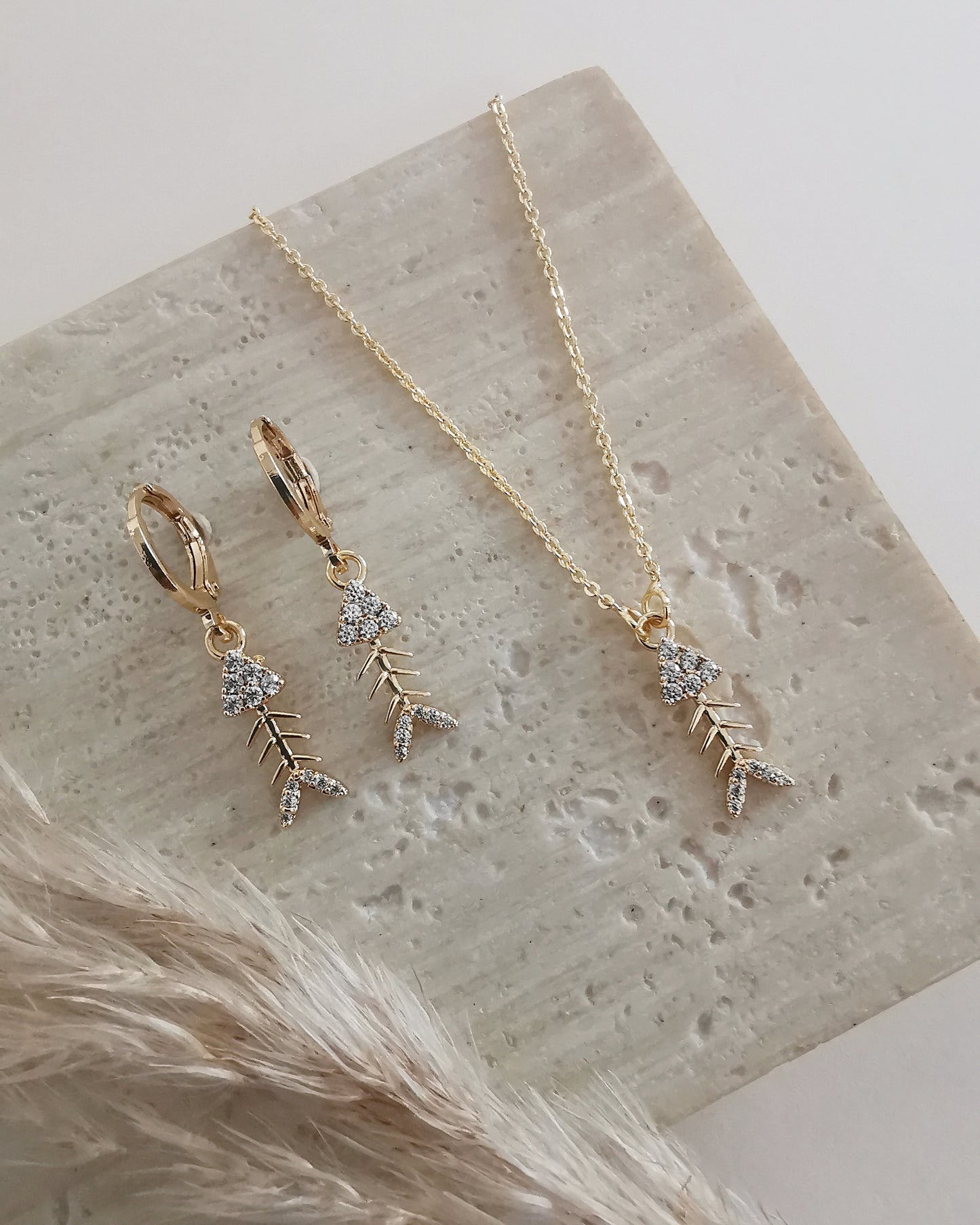 Fish Bone Charm Earrings with Cubic Zirconia Accents.