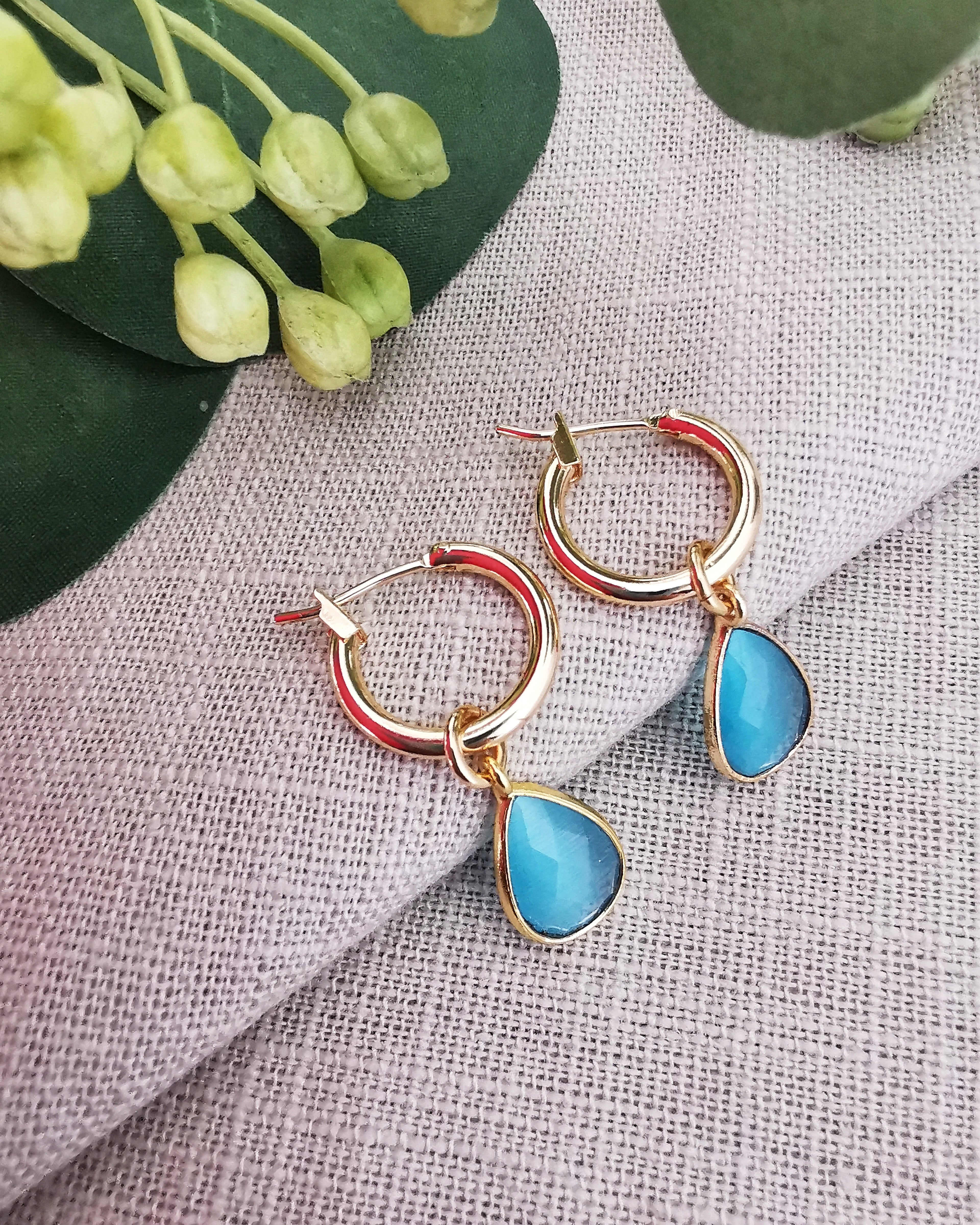 Gold hoop earrings with deals blue stones